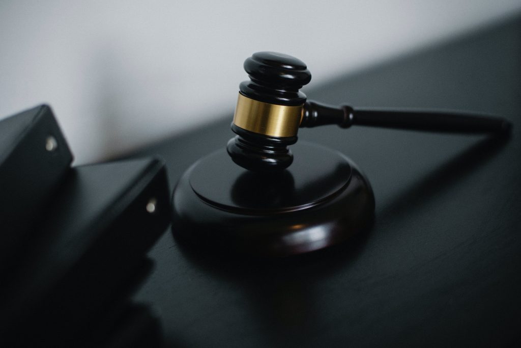 Judges gabble on a black desk with binder books