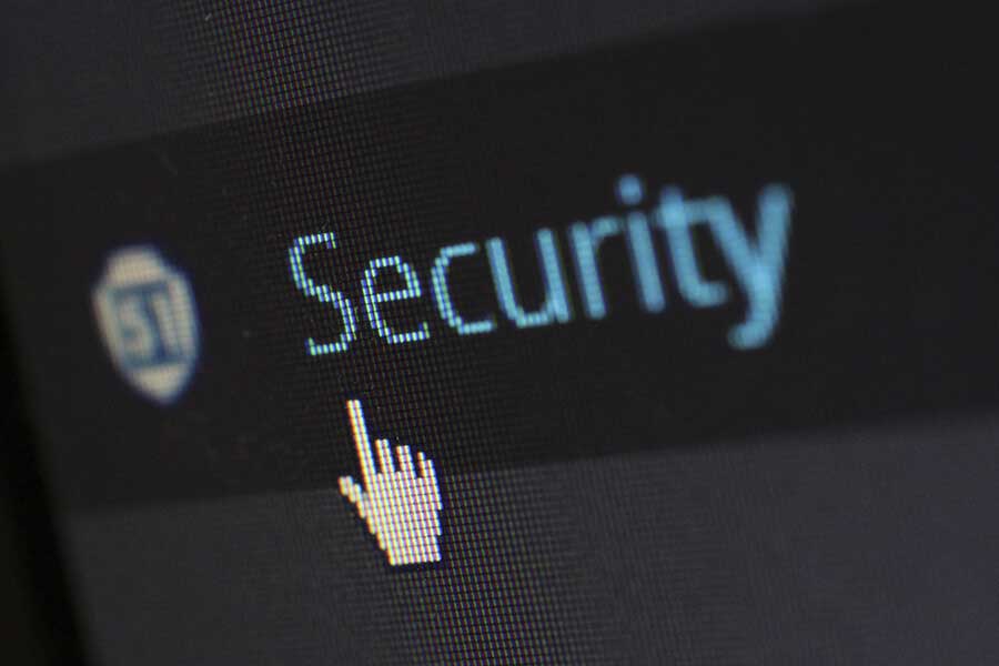 A white cursor hand click a security button on a website