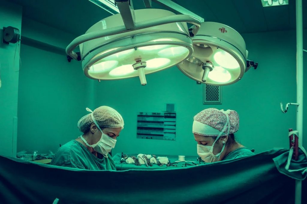 Surgeons in an operating room performing surgery